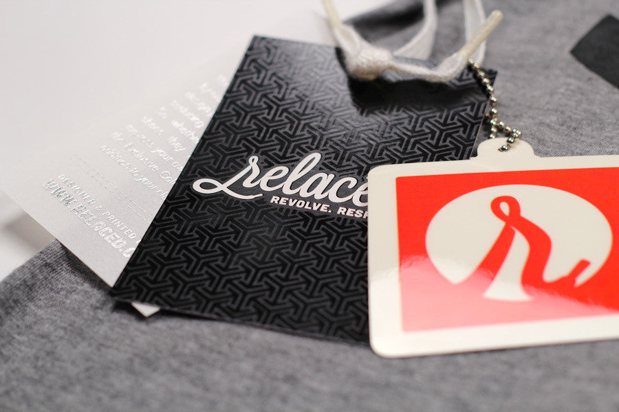 AM95 - exclusive sticker and hangtag